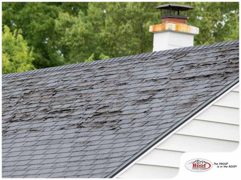 20751610621000roofwithcurledshingles.jpg Roof Masters